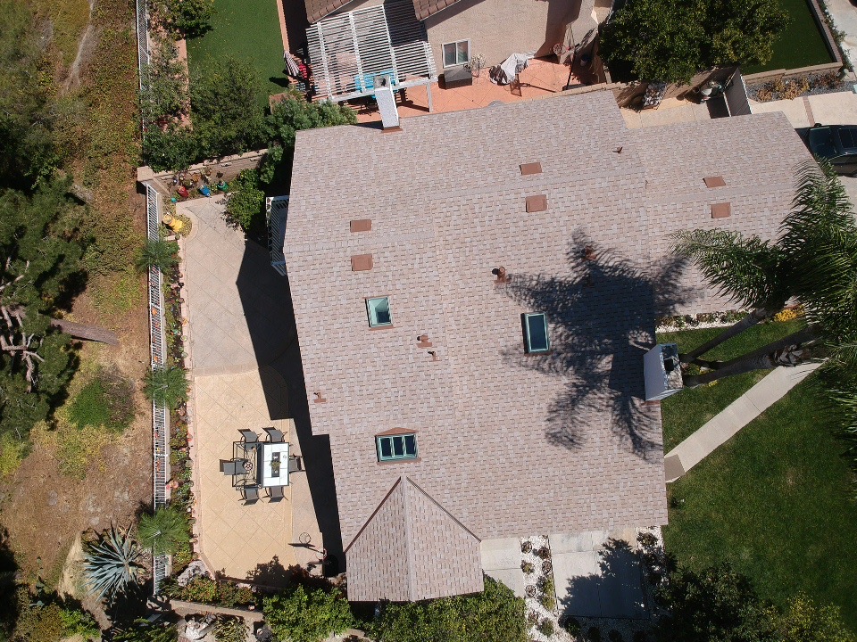 Shingle roofing — completed roof and skylights